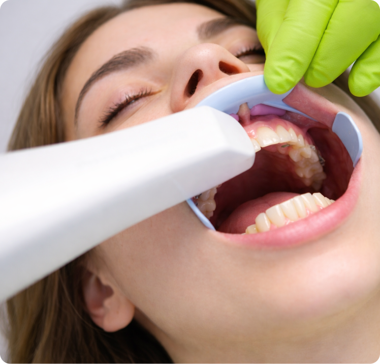 Patient receiving a 3D dental scan at a partner office